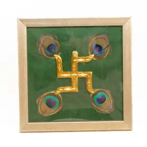 Brass Swastik with Peacock Feathers & Green Silk in Brown frame